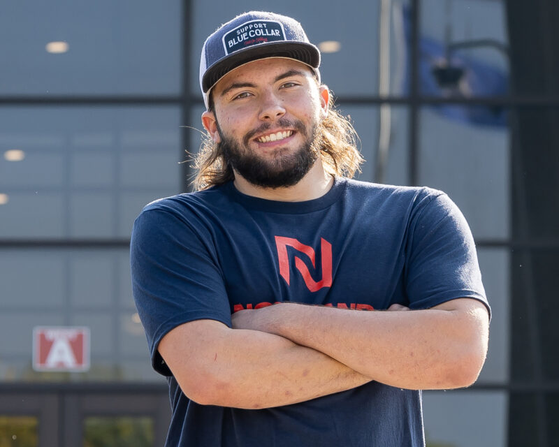 Northland student posing outside campus.